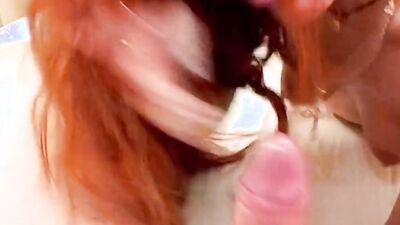 Amazing and attractive German redhead gets her mouth filled