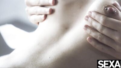 Gorgeous lesbian lovers give each other a sexy naked massage