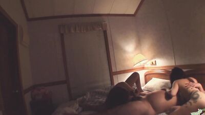 Brunette Asian girl is fed loads of cum by a chubby guy in a threesome