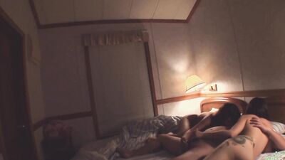 Brunette Asian girl is fed loads of cum by a chubby guy in a threesome