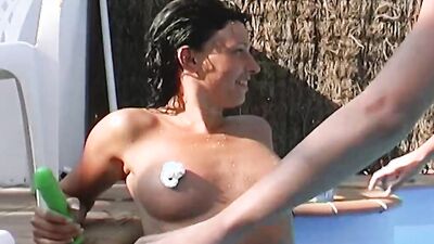 Two super hot chicks from Germany sharing a cock near the pool