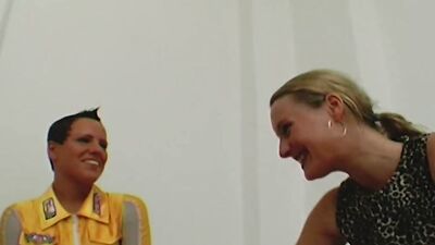 Two sexy and busty German chicks pleasing each other in the bedroom