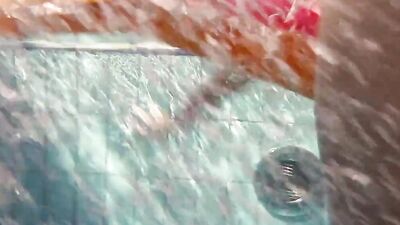 Fun naked girls get naughty in the pool