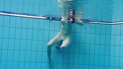 Fun naked girls get naughty in the pool