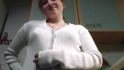 Redhead German teen making a cock cum hard in the kitchen