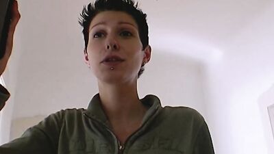 A sexy German babe with short hair loves making a dude cum