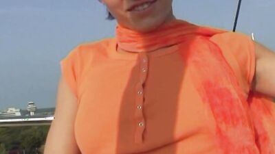 Superb German babe pleasing her pierced pussy outdoors