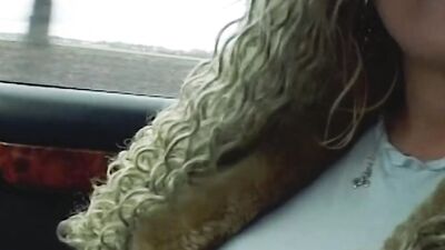 Round titted babe form Germany masturbating and sucking a cock in the car