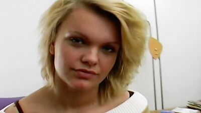 A stunning looking German babe gets her face sprayed by two hard cocks