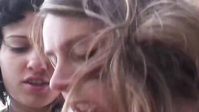 Two curvy German chicks playing with a red dong