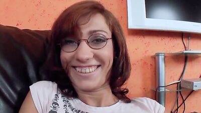 A horny German chick loves stuffing a massive dong inside her