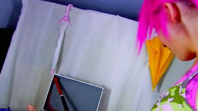 A busty pink haired babe from Germany gets her face sprayed with warm cum