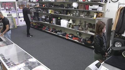 Good looking gal has steamy fuck session in the pawnshop