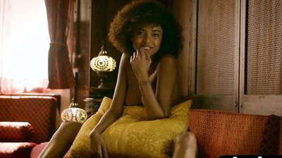 Curly ebony model shows perfect petite body after hot striptease action