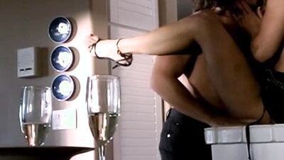 An amazing and busty German babe gets fucked in the kitchen