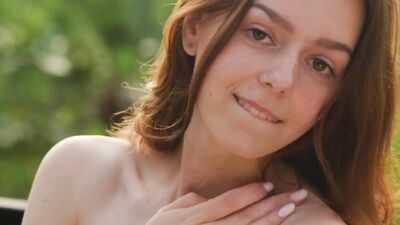 ULTRAFILMS Very cute girl Amber playing with her pussy outdoors
