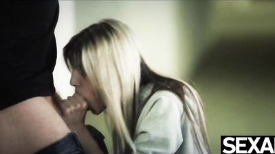 Cute blonde has wild sex up against the parking garage wall