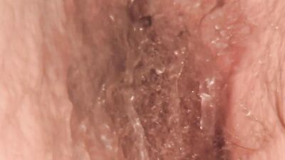 Full Bush Cutie Uses Oil in the Shower