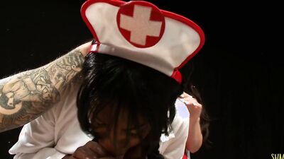 Busty babe watching an ebony nurse suck and ride a dick
