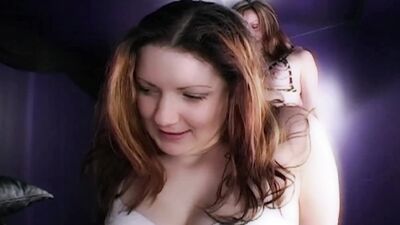 A brunette and a redhead get caught up in the game of lesbian BDSM play