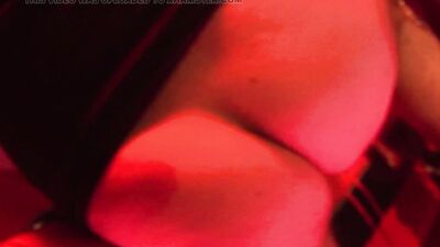 Bound babe strokes off two hard cocks and gets fucked while in a red corset