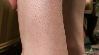 Teddy fondles her hairy twat, armpit hair, and nipples before rubbing her wet snatch.