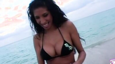 A Brazilian brunette babe in a bikini gets picked up on the beach and banged