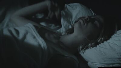 Cute girl studies her pussy in the mirror as she masturbates