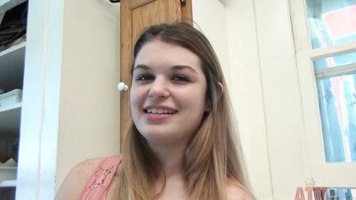 Busty blonde chick rubs her sensitive clit on the kitchen counter
