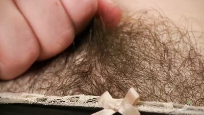 Paulette loves to feel the soft hair on her legs, pussy and more.