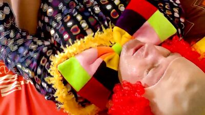 Blonde gets her hole pleasured by a sex toy before the clown fucks her