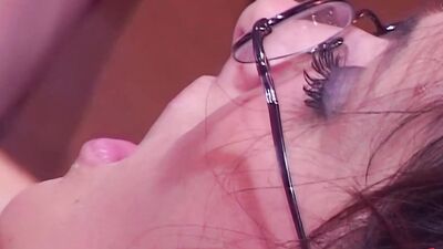 Nerdy brunette girl flaunts her big fake tits in a hot anal threesome
