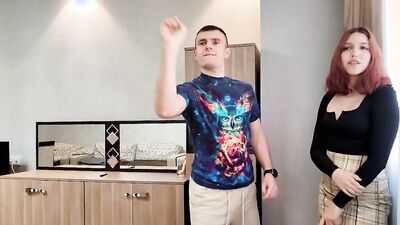 A cute redhead plays strip dart with her friend and loses all rounds