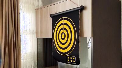 A cute redhead plays strip dart with her friend and loses all rounds