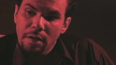 A cute blonde gets horny by porn with a hottie in leather doing anal