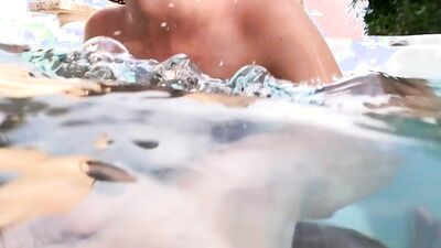 Teen fucks underwater by the pool