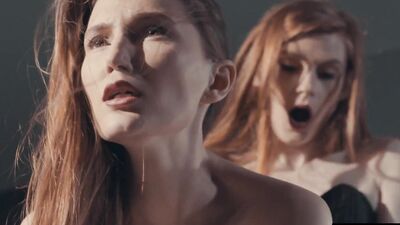 Gorgeous redhead fucks her girlfriend with strapless dildo