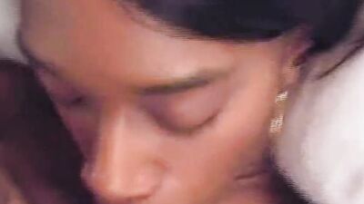 A sexy ebony babe with big tits sucks small white dick