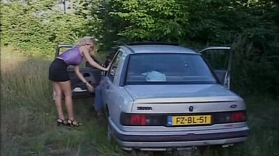 Busty MILF Gets Fucked on the Hood of the Car by a Big Cock That Cums in Her Mouth