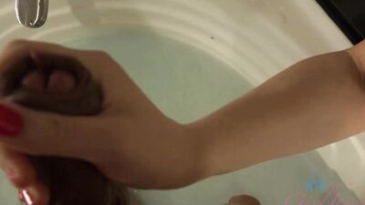 Part 1 of 2: Olive sucks you off in the tub before going at it with her feet