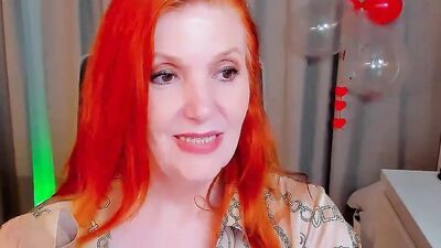 Experience the erotic pleasures of a mature Russian Redhead with big naturals in HD