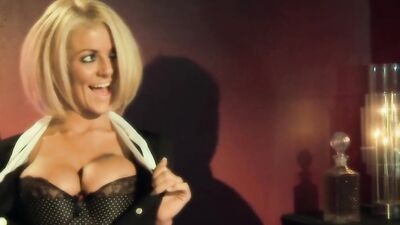 Tia Layne moans in pleasure as she gets pounded from behind on a table