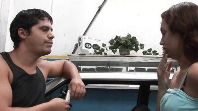 Hot brunette babe with hairless pussy takes a cumshot from mechanic after deepthroating and banging him