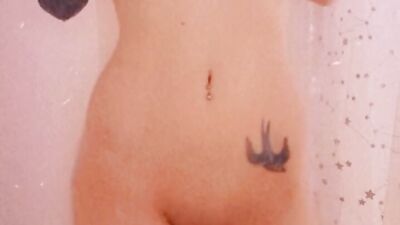 Watch this inked tattooed babe tease and cum hard with her pretty feet