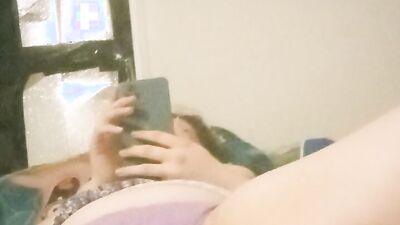 Watch this busty amateur babe orgasm while watching porn with her big tits and wet pussy