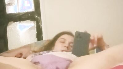 Watch this busty amateur babe orgasm while watching porn with her big tits and wet pussy
