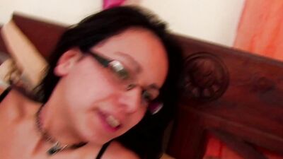 Watch this tattooed MILF with glasses get a hardcore pounding & a sticky load