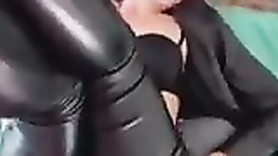 Stepmom in leather suit takes on stepson's massive cock in hot threesome action