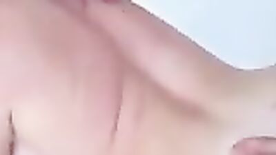 Brunette bombshell with massive tits passionately deepthroats and takes a cumshot in the Jacuzzi