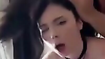 Brunette bombshell with massive tits passionately deepthroats and takes a cumshot in the Jacuzzi